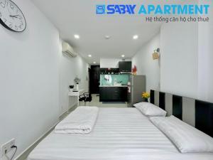 Giường trong phòng chung tại Sabay Airport Apartment - The Connect