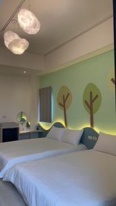 Postel nebo postele na pokoji v ubytování Mi Hai B&B