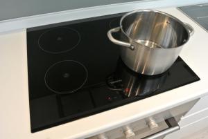A kitchen or kitchenette at Duomo Inn