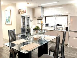 Dapur atau dapur kecil di Okinawa 住宅風ゲストルームM's house