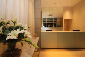 Lobbyen eller receptionen på Flat perfeito na Barra da Tijuca, Link Stay