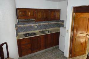 Kuchyň nebo kuchyňský kout v ubytování Residencial Estephany
