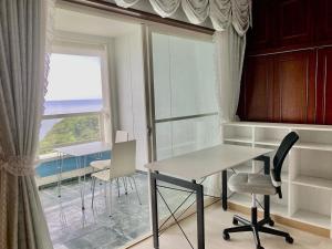 a room with a table and chairs and a large window at sunset hills - Vacation STAY 21373v in Hamada