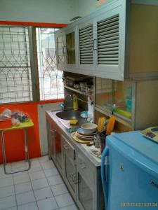 a kitchen with a sink and a counter top at Social Style Culture in Bangkok