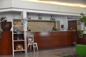a lobby of a hospital with a reception desk at Hotel Bumi Kitri in Bandung