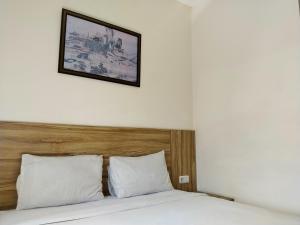 Postel nebo postele na pokoji v ubytování Portal Residence + 28 fotografií