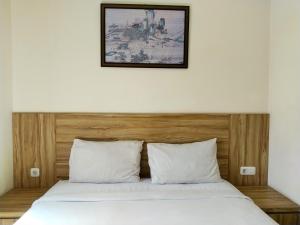 Voodi või voodid majutusasutuse Portal Residence toas