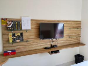 Televiisor ja/või meelelahutuskeskus majutusasutuses Portal Residence