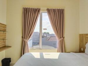 Voodi või voodid majutusasutuse Portal Residence toas