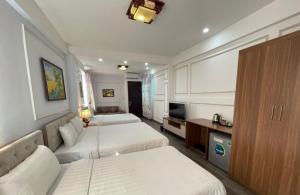 TV a/nebo společenská místnost v ubytování Hanoi City Gate Hotel