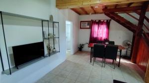 TV a/nebo společenská místnost v ubytování Alojamiento Matheo