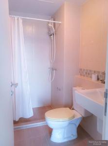 a bathroom with a toilet and a sink and a shower at Rooms hua hin nearby the beach in Hua Hin