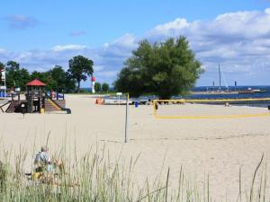 a beach with a volley ball court and a volley ball net at In the Szczecin Lagoon Nature Park in Ueckermünde