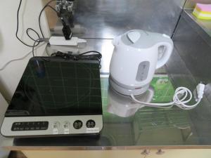 Kuchyň nebo kuchyňský kout v ubytování 札幌市中心部大通公園まで徒歩八分観光移動に便利なロケーションp3112