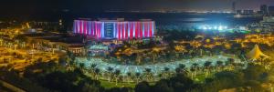 an aerial view of a resort at night at The Ritz-Carlton, Bahrain in Manama