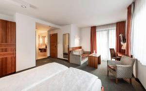 Voodi või voodid majutusasutuse Hotel Clara toas