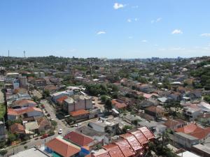 an aerial view of a city with buildings at Apartamento Dom Vital in Porto Alegre