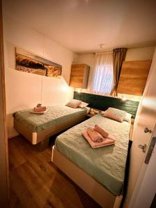 Postel nebo postele na pokoji v ubytování Mobile home TASHA