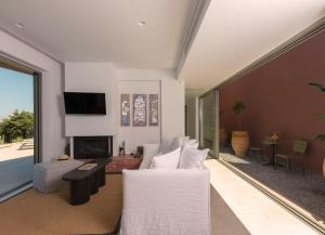 Et opholdsområde på Plethora Luxury Suites
