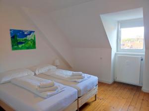 Postel nebo postele na pokoji v ubytování Haus Semmi