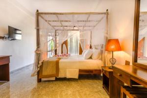 Katil atau katil-katil dalam bilik di Elysia Sigiriya Hotel