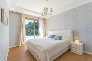 Postel nebo postele na pokoji v ubytování Gran Piscina Hidromasaje playa privada y sauna