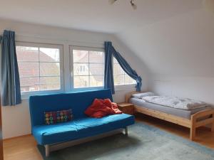 Postel nebo postele na pokoji v ubytování Gemütliche Ferienwohnung