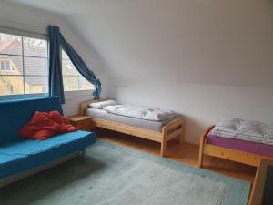 Postel nebo postele na pokoji v ubytování Gemütliche Ferienwohnung