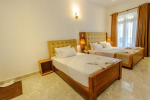 Elysia Sigiriya Hotel客房内的一张或多张床位