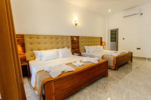 Elysia Sigiriya Hotel客房内的一张或多张床位