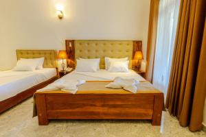 Elysia Sigiriya Hotel客房内的一张或多张床位