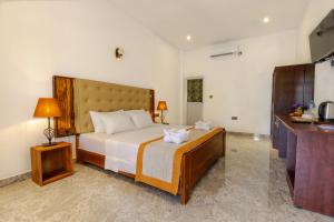 Elysia Sigiriya Hotel客房内的一张或多张床位