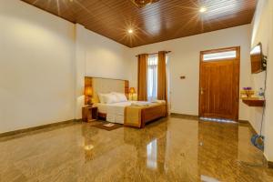 Elysia Sigiriya Hotel客房内的一张或多张床位