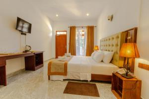 Elysia Sigiriya Hotel客房内的一张或多张床位