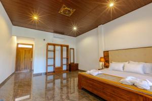 Elysia Sigiriya Hotel客房内的一张或多张床位