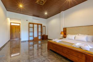 Elysia Sigiriya Hotel客房内的一张或多张床位