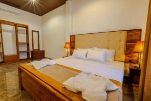 Elysia Sigiriya Hotel客房内的一张或多张床位