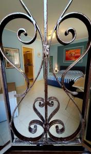 Postel nebo postele na pokoji v ubytování Scilla Guest House -per prenotazioni telefonare-