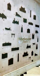 サンパウロにあるHotel M-RCURE Av Paulista - The Royal king Duplex Studio - Deluxe Business Edition - Executive Class - By LuXXoRの壁面