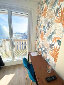 Фотография из галереи L'Escale Appartements et Suites en bord de Mer в Гавре