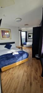 Voodi või voodid majutusasutuse Cornmill Hotel toas