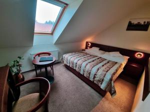 Postel nebo postele na pokoji v ubytování Hotel Mario + 37 fotografií