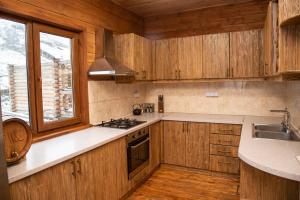 Kuchyň nebo kuchyňský kout v ubytování Ranger Campus Eco Lodge + 31 fotografií