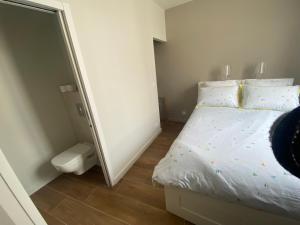 Postel nebo postele na pokoji v ubytování La Maison de l'Olivier