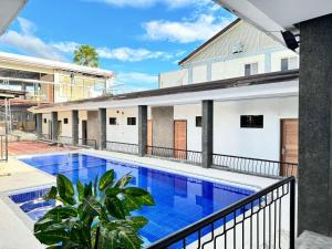 a view of a swimming pool on a balcony at Bavarian Guest House in Angeles