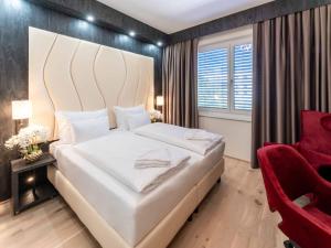 Postel nebo postele na pokoji v ubytování PLAZA Residence Wiener Neustadt