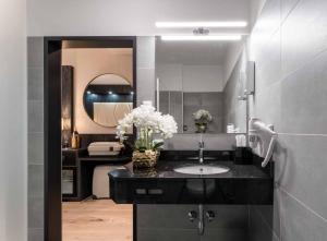 Kuchyň nebo kuchyňský kout v ubytování PLAZA Residence Wiener Neustadt