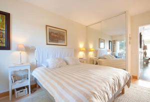 En eller flere senge i et værelse på Face mer : Les Vagues Bauloises