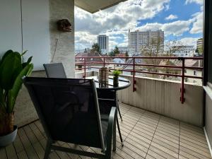 a balcony with a table and a laptop on it at 3 Zimmer Apartment, 95 qm, max 5 Personen, Balkon, Garage, Internet 100 MBit in Leonberg