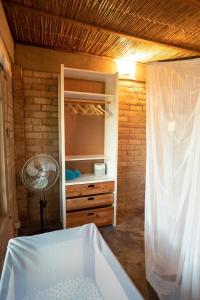 Katil atau katil-katil dalam bilik di Inhambane Bay View Home